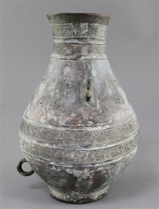 A Chinese archaic bronze ritual drinking vessel, Hu, 6th century B.C., 31cm